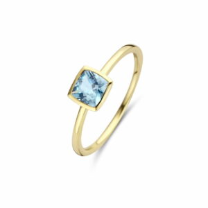 bague mini coussin topaze bleue sky serti clos sur or jaune 18 carats
