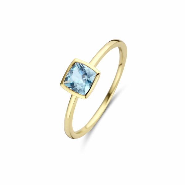 bague mini coussin topaze bleue sky serti clos sur or jaune 18 carats