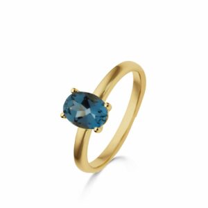 Bague Solitaire 4 griffes Topaze Blue London or jaune 18 carats
