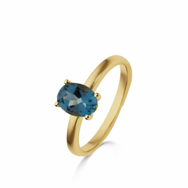 Bague Solitaire 4 griffes Topaze Blue London or jaune 18 carats