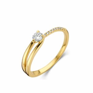 Solitaire accompagné or jaune 18 carats 750/000ème et diamants