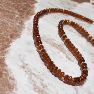 Collier perles grenat hessonite facetté AAA sur or jaune 18 carats