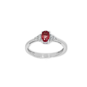 Bague rubis ovale accompagné diamants sur or blanc 18 carats 750/000ème