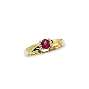 Bague rubis demi serti diamants griffes or jaune 18 carats 750/000ème