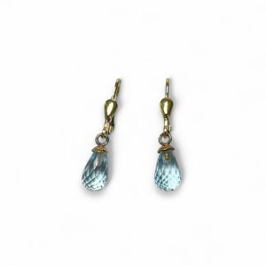 Bijoux d'oreilles dormeuses topazes bleues facettées or jaune 18 carats